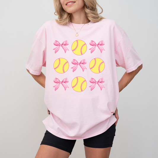 Coquette Softball Bow T-Shirt | Comfort Colors Cotton | Cute Game Day Tee with Pink Bows & Yellow Softballs | Girly Sports Shirt
