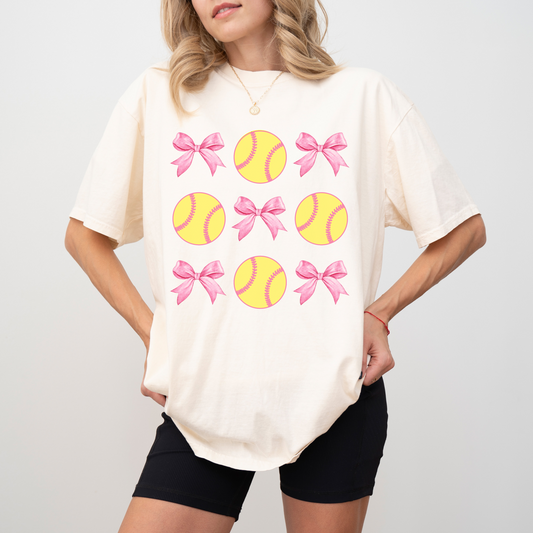Coquette Softball Bow T-Shirt | Comfort Colors Cotton | Cute Game Day Tee with Pink Bows & Yellow Softballs | Girly Sports Shirt